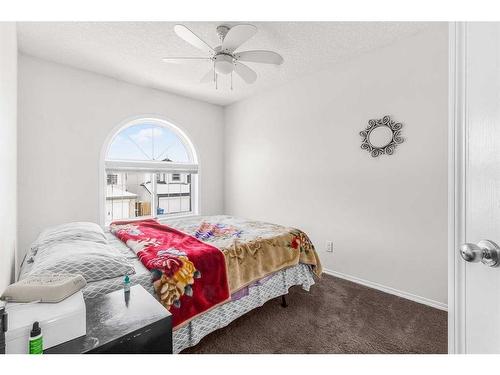 291 Taracove Estate Drive Ne, Calgary, AB - Indoor Photo Showing Bedroom