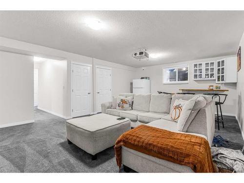 291 Taracove Estate Drive Ne, Calgary, AB - Indoor Photo Showing Living Room