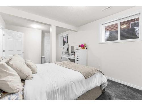 291 Taracove Estate Drive Ne, Calgary, AB - Indoor Photo Showing Bedroom