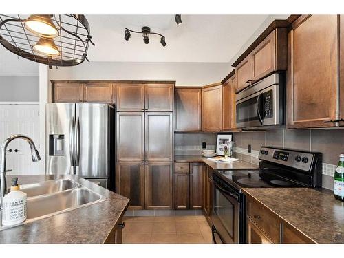 42 Mahogany Terrace Se, Calgary, AB - Indoor Photo Showing Kitchen With Double Sink