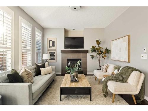 42 Mahogany Terrace Se, Calgary, AB - Indoor Photo Showing Living Room With Fireplace