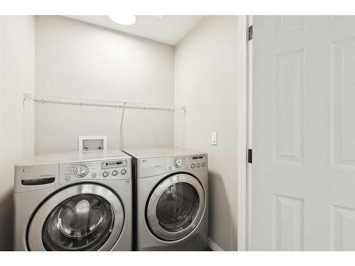 42 Mahogany Terrace Se, Calgary, AB - Indoor Photo Showing Laundry Room