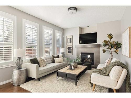 42 Mahogany Terrace Se, Calgary, AB - Indoor Photo Showing Living Room With Fireplace