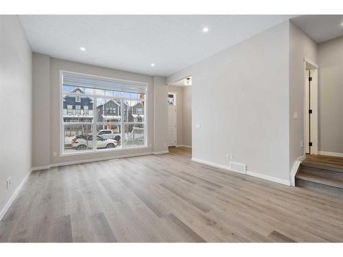 362 Masters Road Se, Calgary, AB - Indoor Photo Showing Living Room