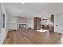 417 Huntley Way Ne, Calgary, AB  - Indoor Photo Showing Living Room With Fireplace 