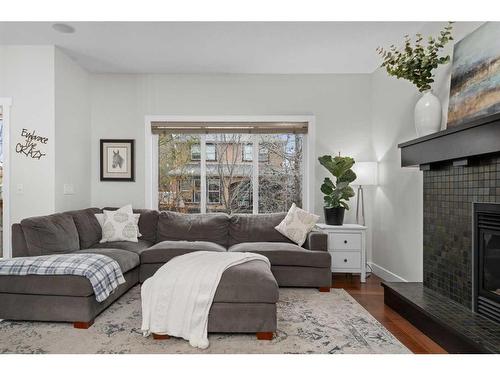 97 Mahogany Square Se, Calgary, AB - Indoor Photo Showing Living Room With Fireplace