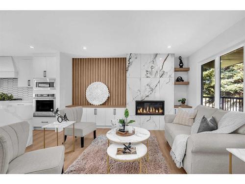 199 Westview Drive Sw, Calgary, AB - Indoor Photo Showing Living Room With Fireplace