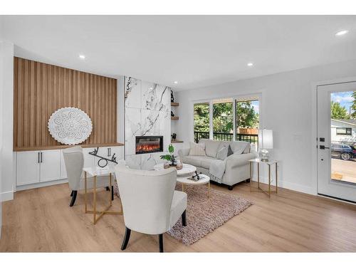 199 Westview Drive Sw, Calgary, AB - Indoor Photo Showing Living Room With Fireplace