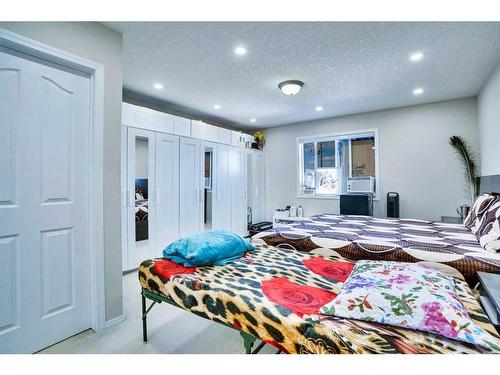 116 Saddlecrest Gardens Ne, Calgary, AB - Indoor Photo Showing Bedroom