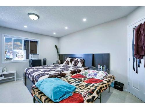 116 Saddlecrest Gardens Ne, Calgary, AB - Indoor Photo Showing Bedroom