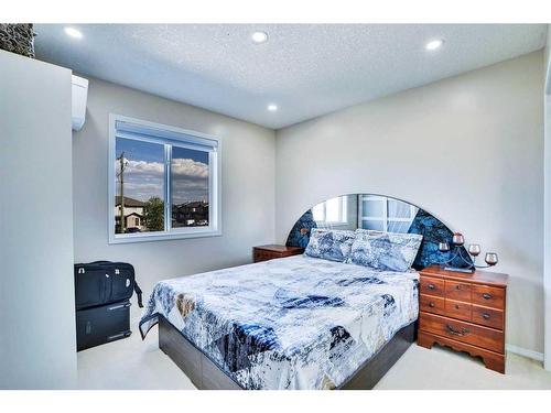 116 Saddlecrest Gardens Ne, Calgary, AB - Indoor Photo Showing Bedroom