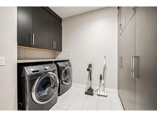 213 Springbluff Boulevard Sw, Calgary, AB - Indoor Photo Showing Laundry Room