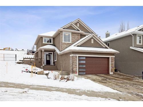 213 Springbluff Boulevard Sw, Calgary, AB - Outdoor With Facade