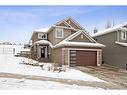 213 Springbluff Boulevard Sw, Calgary, AB  - Outdoor With Facade 