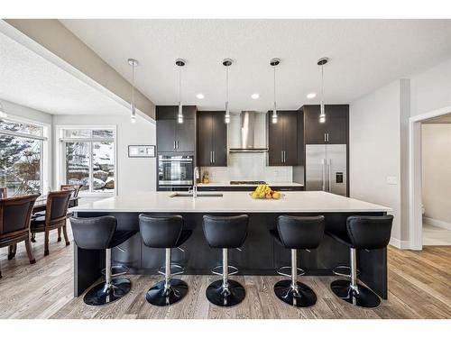 213 Springbluff Boulevard Sw, Calgary, AB - Indoor Photo Showing Kitchen With Upgraded Kitchen