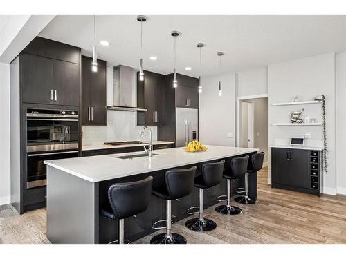 213 Springbluff Boulevard Sw, Calgary, AB - Indoor Photo Showing Kitchen With Upgraded Kitchen