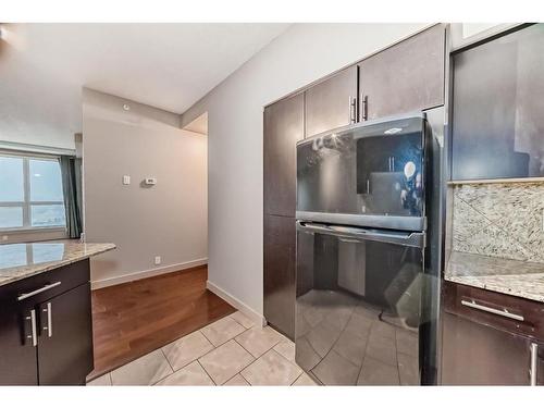 1607-8710 Horton Road Sw, Calgary, AB - Indoor Photo Showing Kitchen