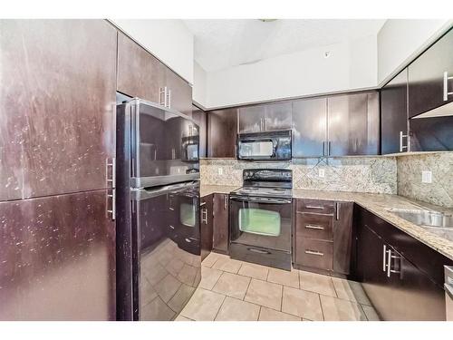 1607-8710 Horton Road Sw, Calgary, AB - Indoor Photo Showing Kitchen