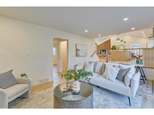 10727 Willowfern Drive Se, Calgary, AB - Indoor Photo Showing Living Room