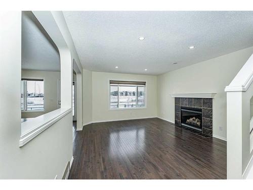 110 Saddlecrest Close Ne, Calgary, AB - Indoor With Fireplace