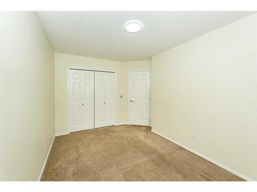 110 Saddlecrest Close Ne, Calgary, AB - Indoor Photo Showing Other Room