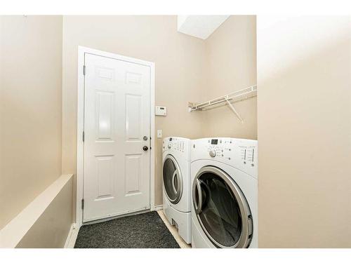 110 Saddlecrest Close Ne, Calgary, AB - Indoor Photo Showing Laundry Room