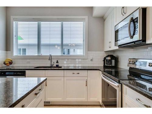 1261 Legacy Circle Se, Calgary, AB - Indoor Photo Showing Kitchen With Stainless Steel Kitchen With Upgraded Kitchen