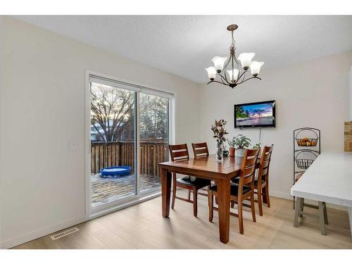 208 Mt Selkirk Close Se, Calgary, AB - Indoor Photo Showing Dining Room