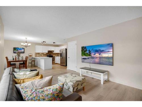 208 Mt Selkirk Close Se, Calgary, AB - Indoor Photo Showing Living Room