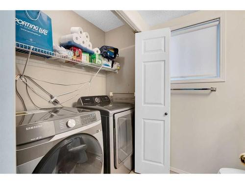 208 Mt Selkirk Close Se, Calgary, AB - Indoor Photo Showing Laundry Room