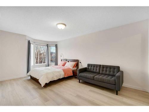 208 Mt Selkirk Close Se, Calgary, AB - Indoor Photo Showing Bedroom