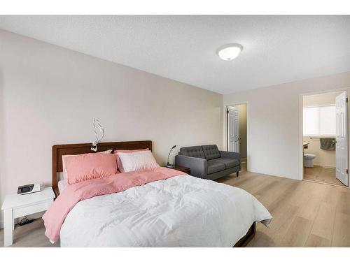 208 Mt Selkirk Close Se, Calgary, AB - Indoor Photo Showing Bedroom