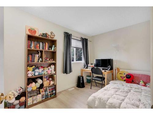 208 Mt Selkirk Close Se, Calgary, AB - Indoor Photo Showing Bedroom