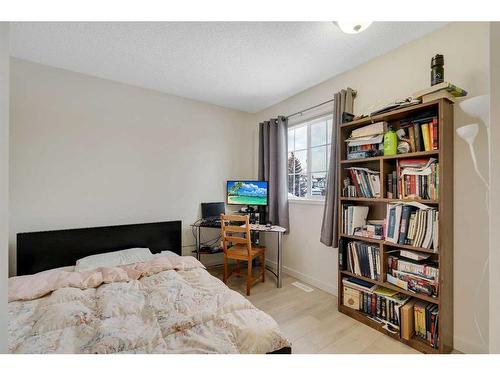 208 Mt Selkirk Close Se, Calgary, AB - Indoor Photo Showing Bedroom