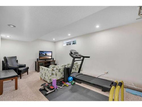 208 Mt Selkirk Close Se, Calgary, AB - Indoor Photo Showing Gym Room