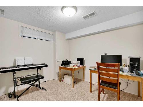 208 Mt Selkirk Close Se, Calgary, AB - Indoor Photo Showing Office