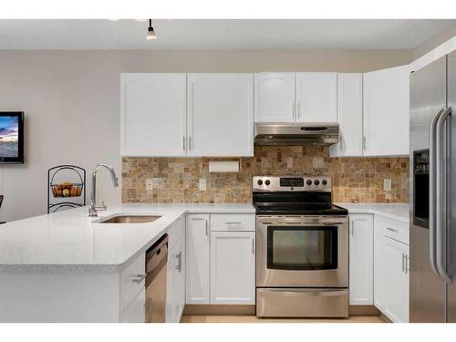 208 Mt Selkirk Close Se, Calgary, AB - Indoor Photo Showing Kitchen With Stainless Steel Kitchen With Upgraded Kitchen