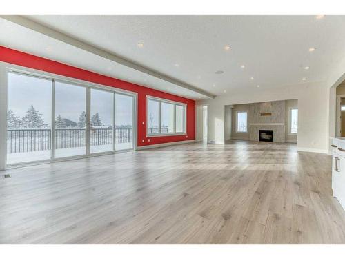 41 Farries Drive Se, Airdrie, AB - Indoor Photo Showing Living Room With Fireplace