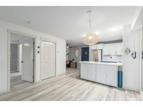 109-304 Cranberry Park Se, Calgary, AB - Indoor Photo Showing Kitchen