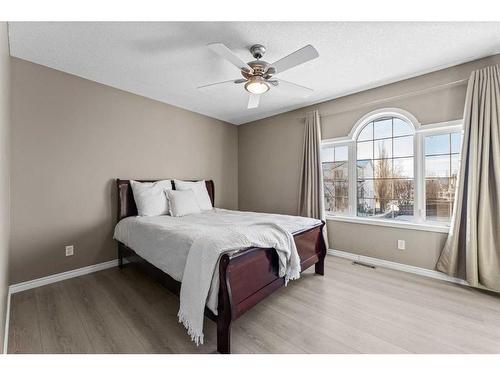 106 Creek Gardens Place Nw, Airdrie, AB - Indoor Photo Showing Bedroom