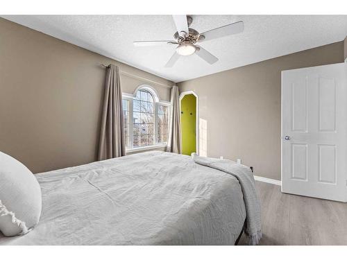 106 Creek Gardens Place Nw, Airdrie, AB - Indoor Photo Showing Bedroom