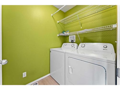 106 Creek Gardens Place Nw, Airdrie, AB - Indoor Photo Showing Laundry Room