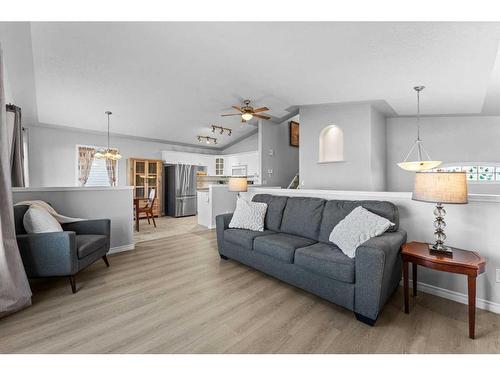 106 Creek Gardens Place Nw, Airdrie, AB - Indoor Photo Showing Living Room