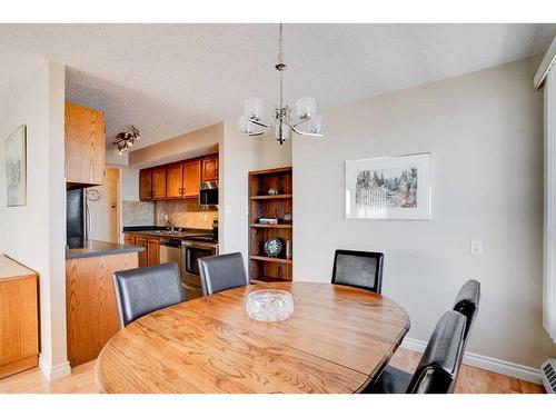 1209-9800 Horton Road Sw, Calgary, AB - Indoor Photo Showing Dining Room