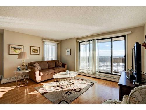 1209-9800 Horton Road Sw, Calgary, AB - Indoor Photo Showing Living Room