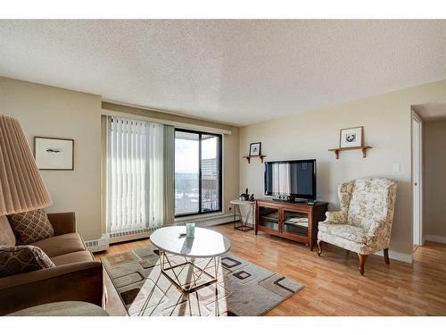 1209-9800 Horton Road Sw, Calgary, AB - Indoor Photo Showing Living Room