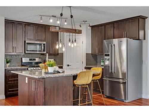 24 Tuscarora Place Nw, Calgary, AB - Indoor Photo Showing Kitchen With Stainless Steel Kitchen With Upgraded Kitchen