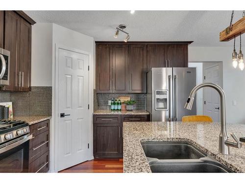 24 Tuscarora Place Nw, Calgary, AB - Indoor Photo Showing Kitchen With Stainless Steel Kitchen With Double Sink With Upgraded Kitchen