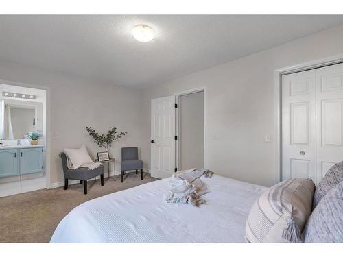 24 Tuscarora Place Nw, Calgary, AB - Indoor Photo Showing Bedroom