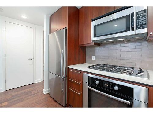 407-1118 12 Avenue Sw, Calgary, AB - Indoor Photo Showing Kitchen With Stainless Steel Kitchen